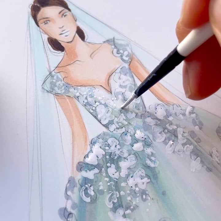 Holly Nicholsのインスタグラム：「Blue Bridal Process Video 💗 sketched with @copic_official gown design @eliesaabworld 💗 #eliesaab #eliesaabcouture #couture #coutureweek #bridalgown #wedding #weddingdress #copicmarker #asmr」