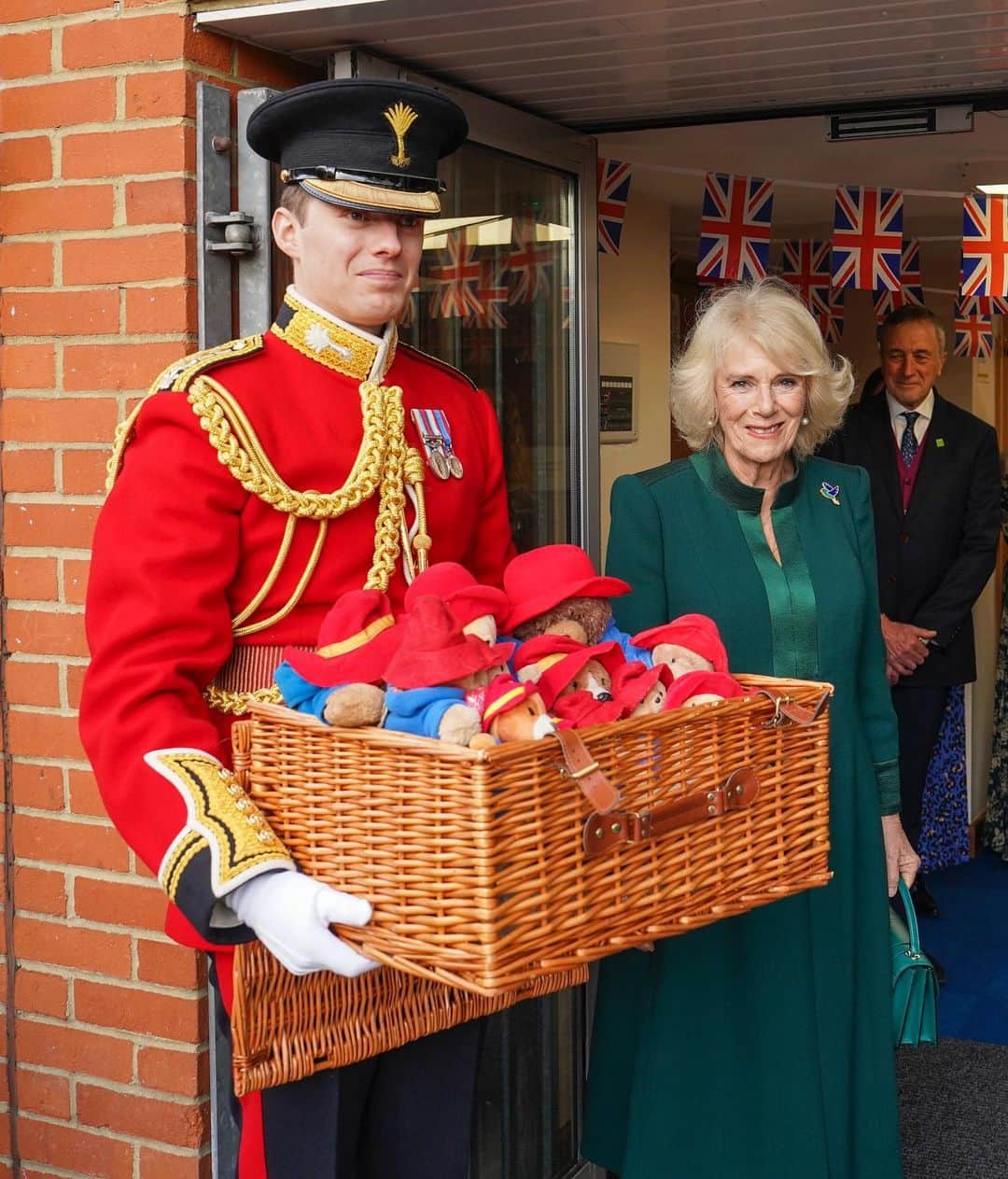 Just Jaredのインスタグラム：「Queen Consort Camilla distributes hundreds of Paddington Bears to children in East London. #QueenConsortCamilla Photos: Getty」